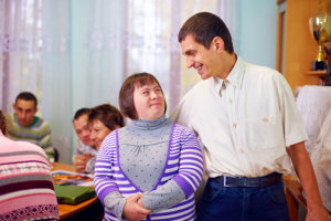 happy people with disability in a rehabilation center